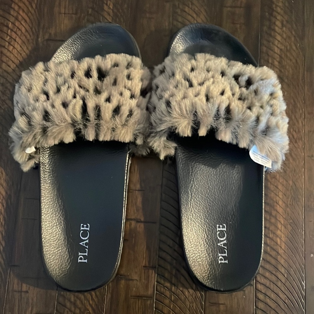 Place Girls size 6 animal print slip ons.
